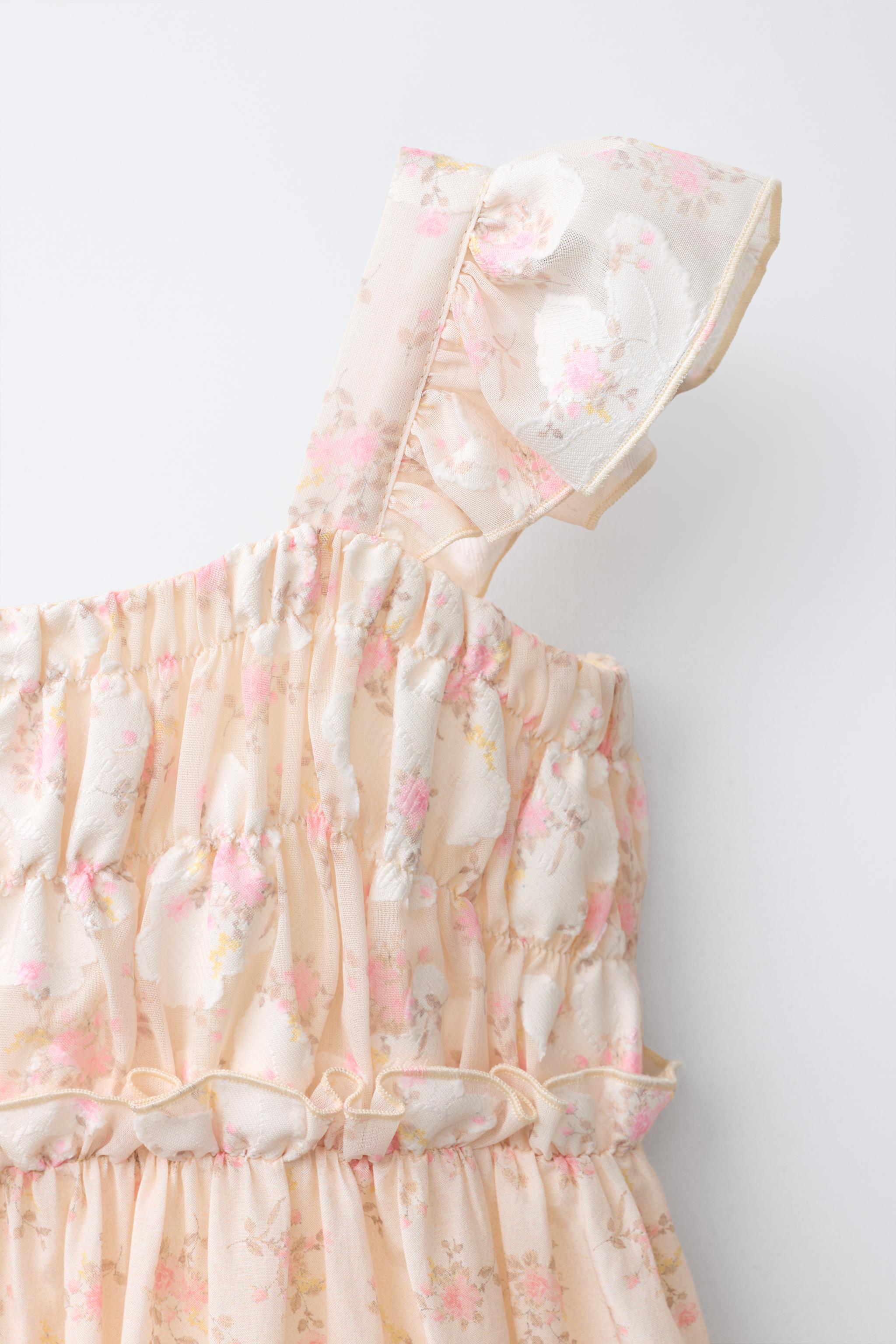 ROBE EN MATIÈRES VARIÉES À FLEURS